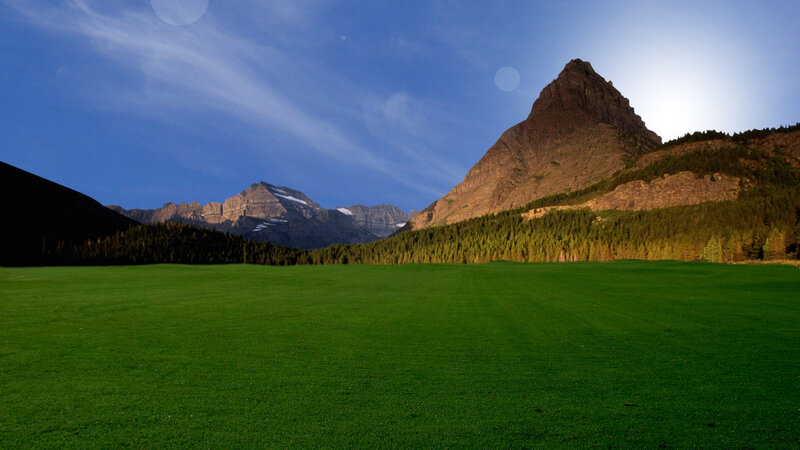 Green Field with Mountains — Serene, Sunset