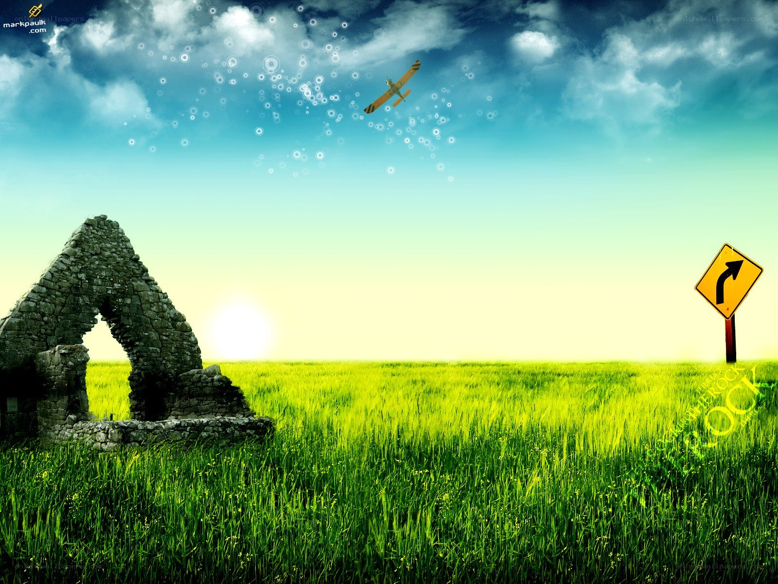Green field with old ruin