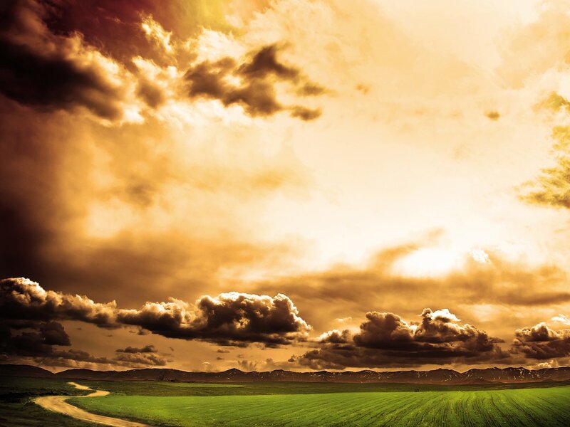 Green Field with Winding Road — Dramatic, Sunset