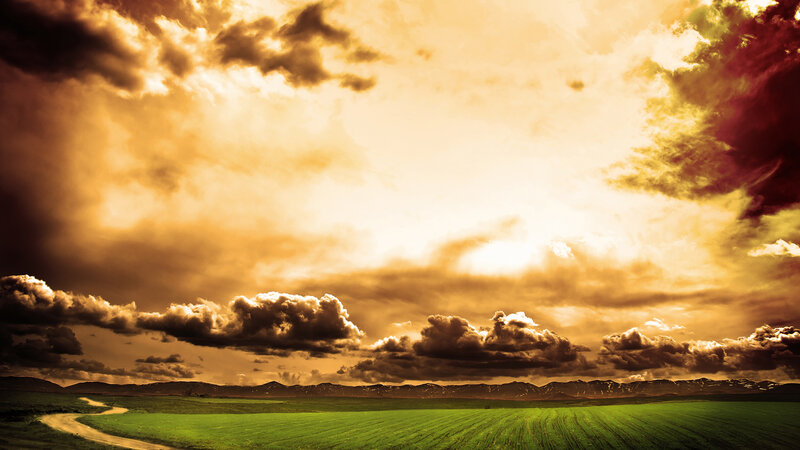 Green Field with Winding Road — Dramatic