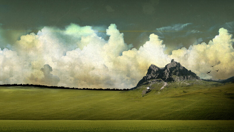 Green Fields and Mountain Sky