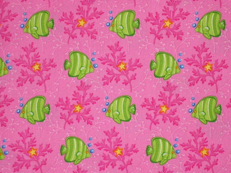 Green Fish on Pink Fabric