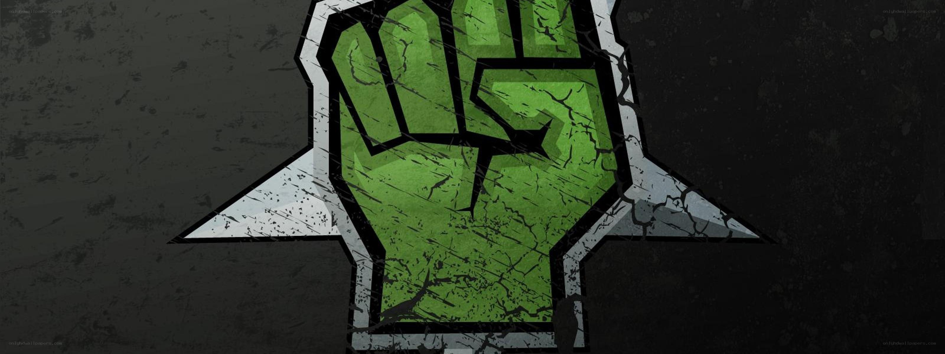 green fist logo on cracked background