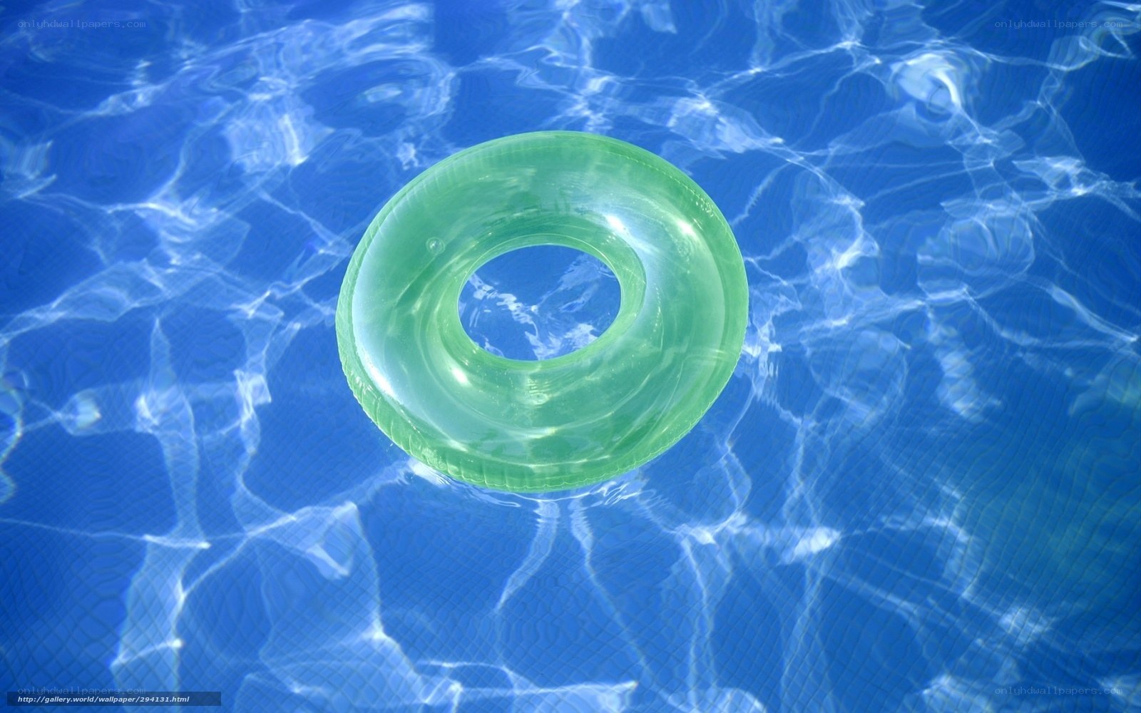 Green float in pool water