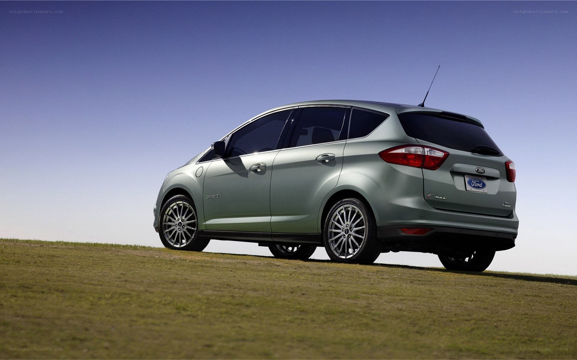 Green Ford C-Max on a hill