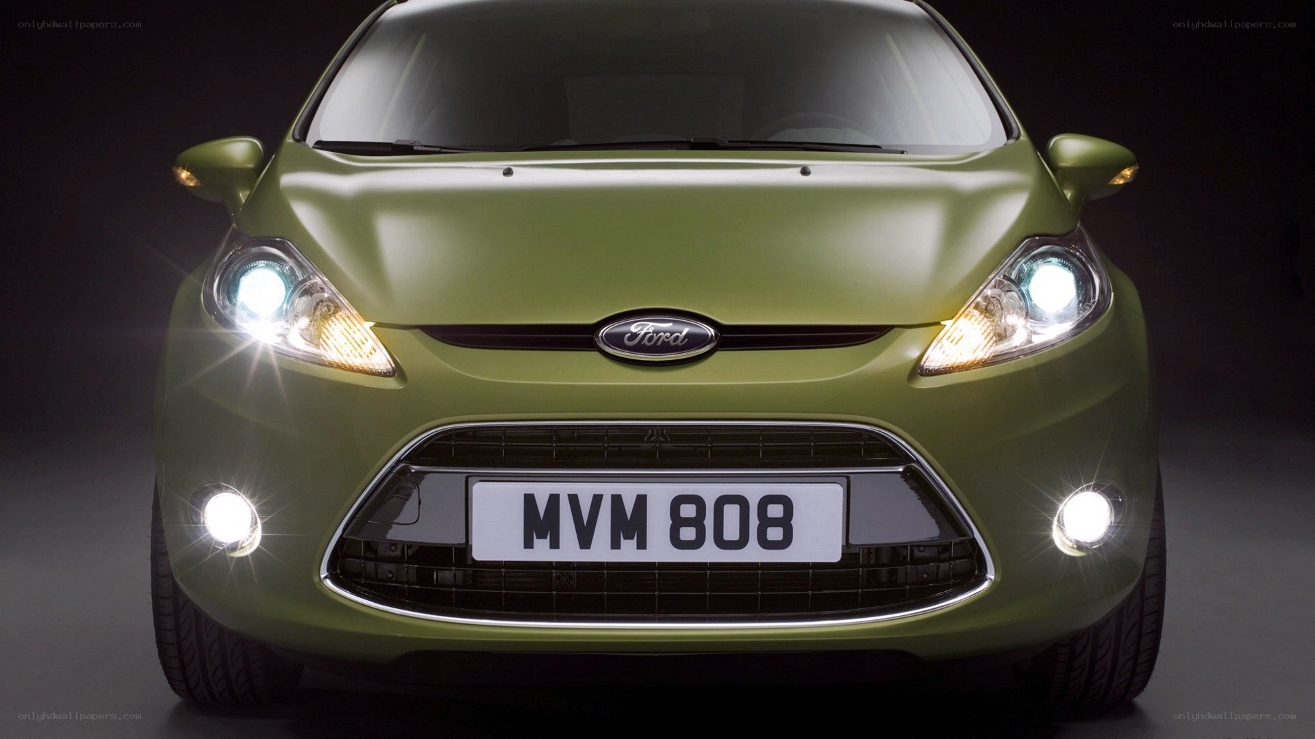 Green Ford Fiesta front view