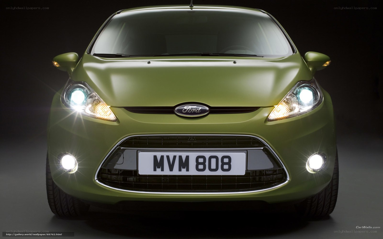 Green Ford Fiesta front view