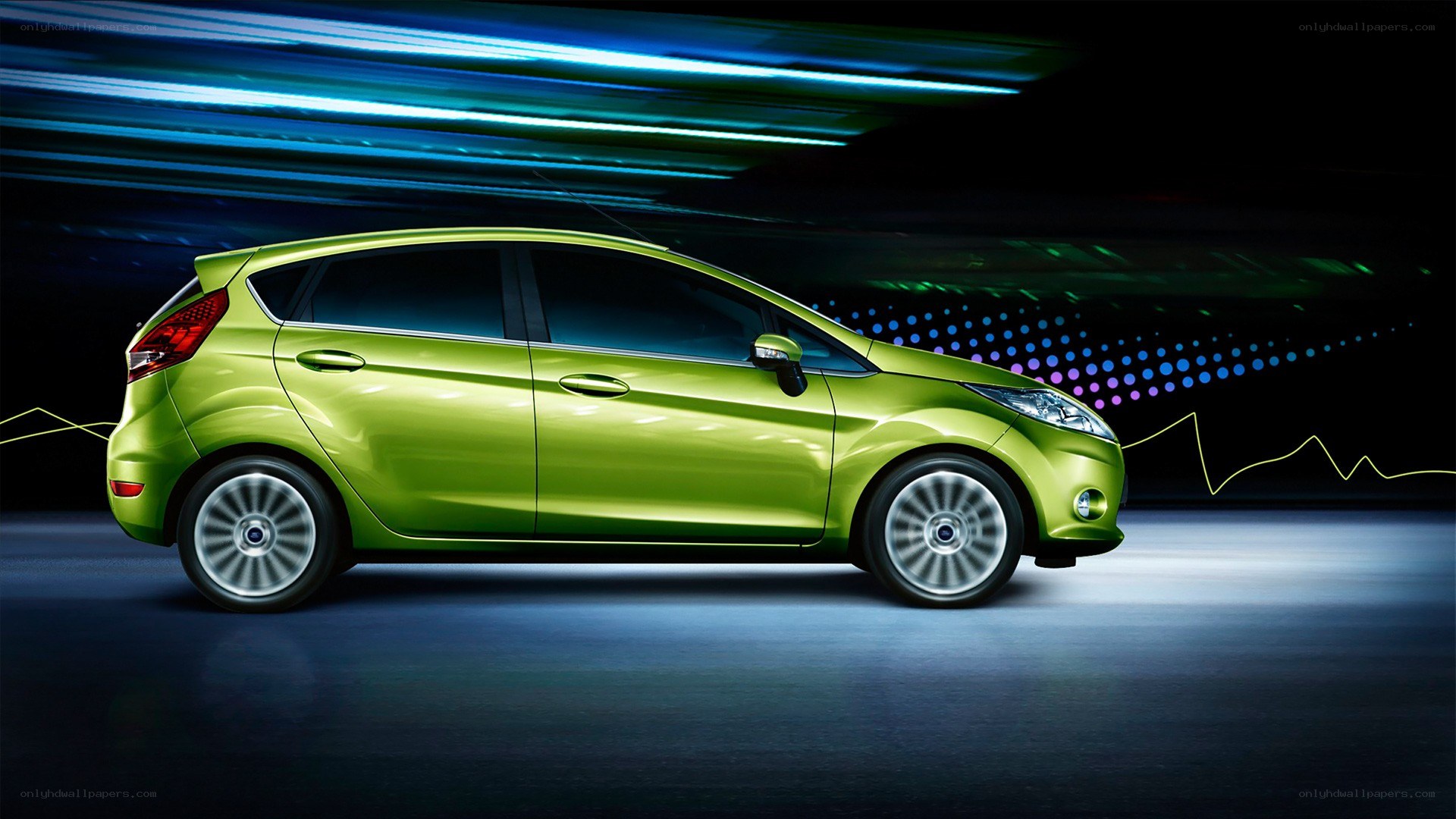 Green Ford Fiesta in motion