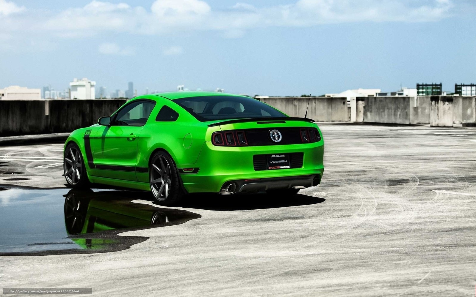 green ford mustang on rooftop