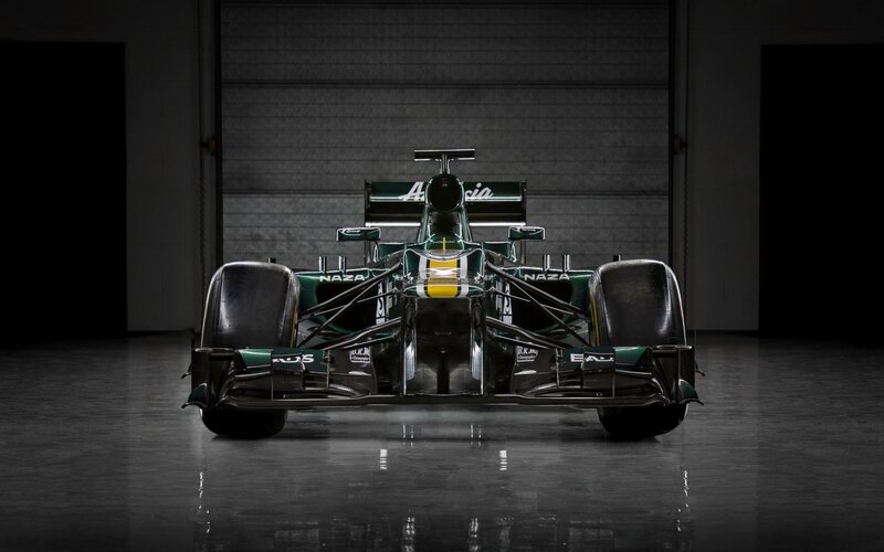 Green Formula One Car — Dramatic, Photograph, Race Car