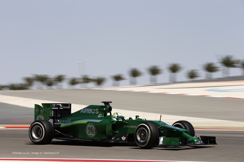 Green Formula One Car — Dynamic, Afternoon, Photograph, Driver, Race Track, Palm Trees