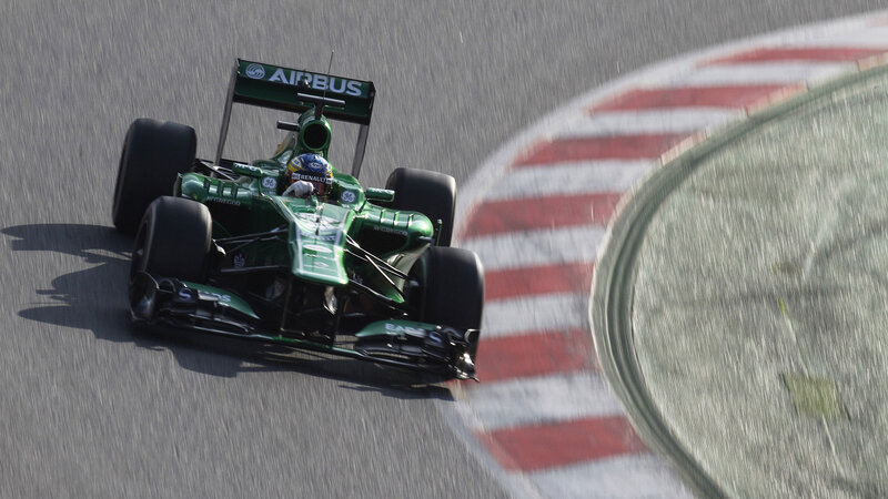 Green Formula One Car — Dynamic, Afternoon, Photograph, Driver, Race Track, Tire