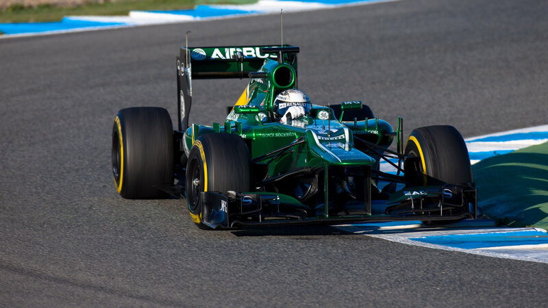 Green Formula One Car — Dynamic, Afternoon, Photograph, Driver, Race Track, Tires