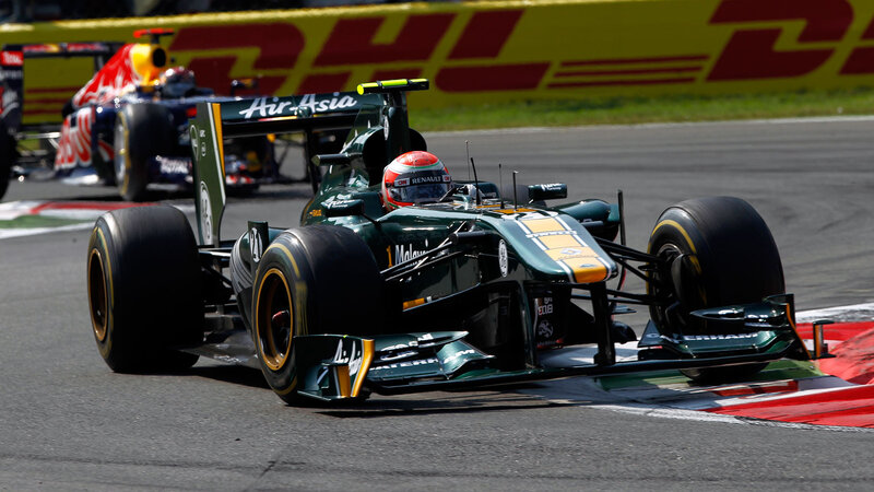 Green Formula One Car — Dynamic, Afternoon, Photograph, Driver