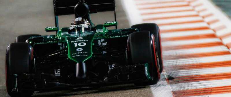 Green Formula One Car — Dynamic, Night, Photograph, Racing Driver