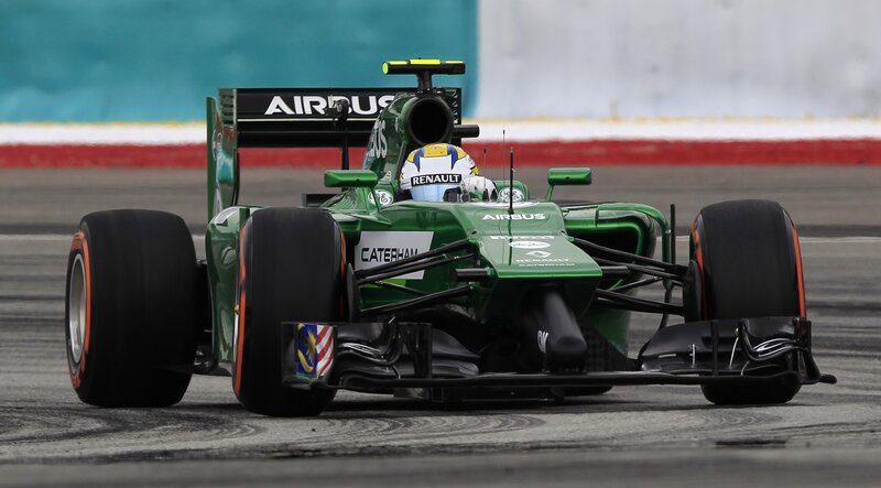 Green Formula One Car — Dynamic, Photograph, Driver, Race Track, Tire