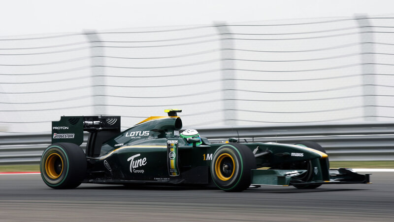 Green Formula One Car — Dynamic, Photograph