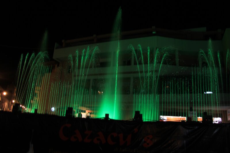 Green fountain at night