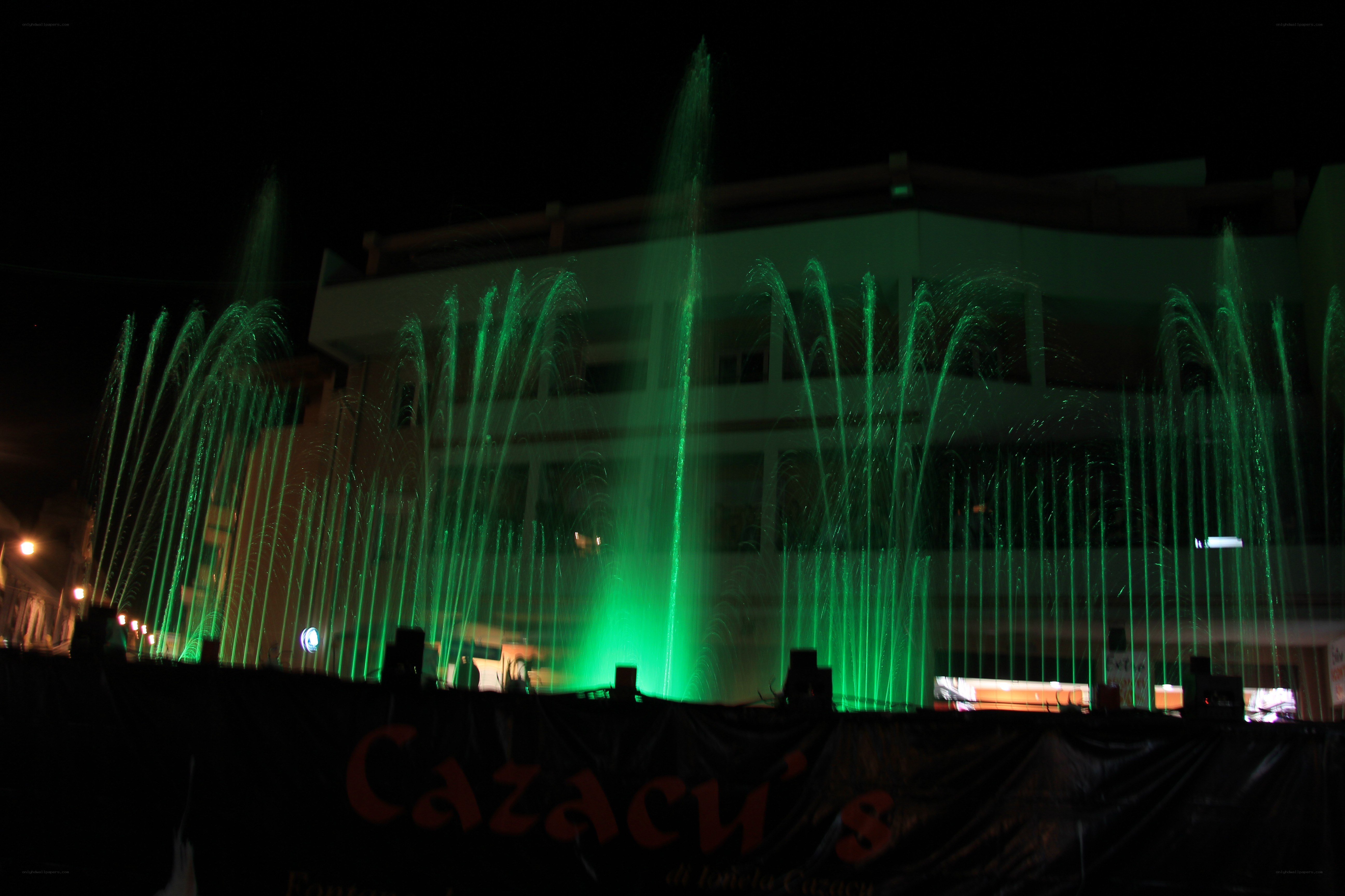 Green fountain at night