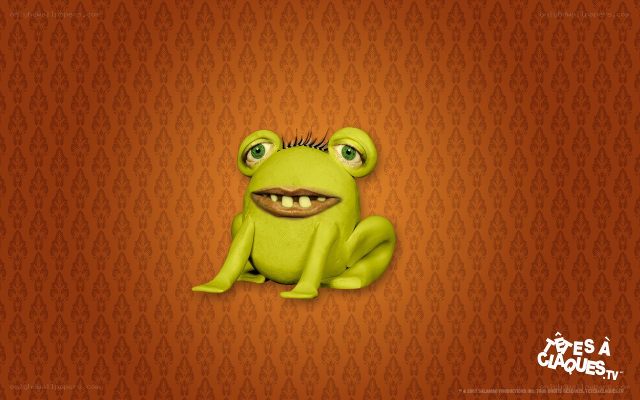 green frog character on wallpaper