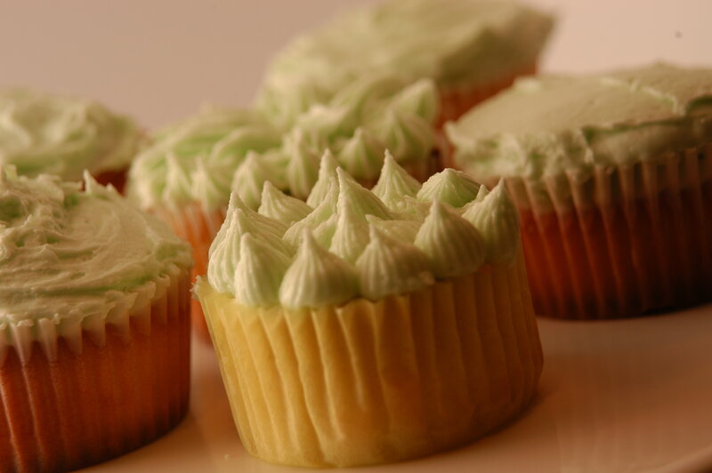 Green-frosted cupcakes