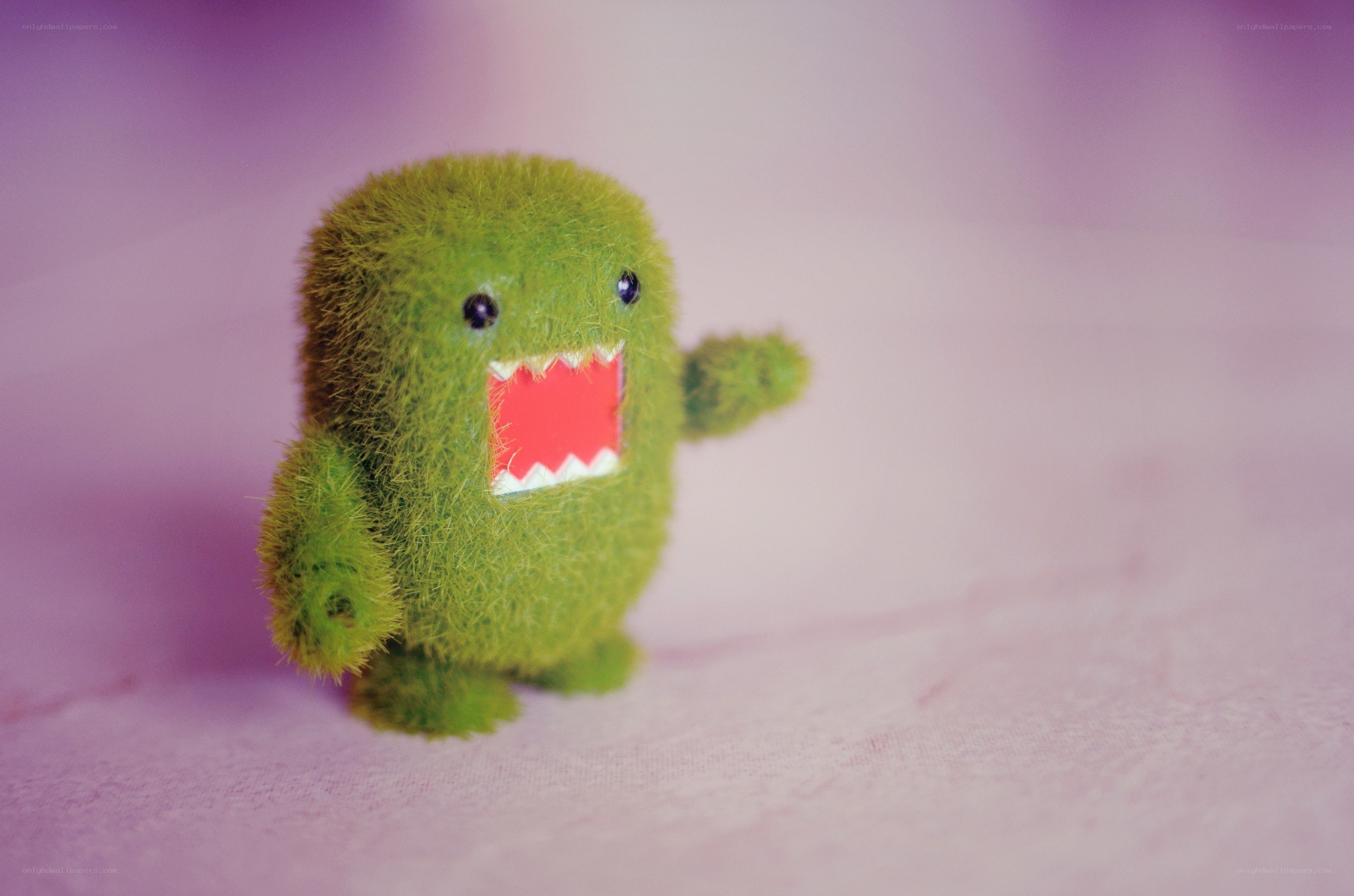 green fuzzy monster toy