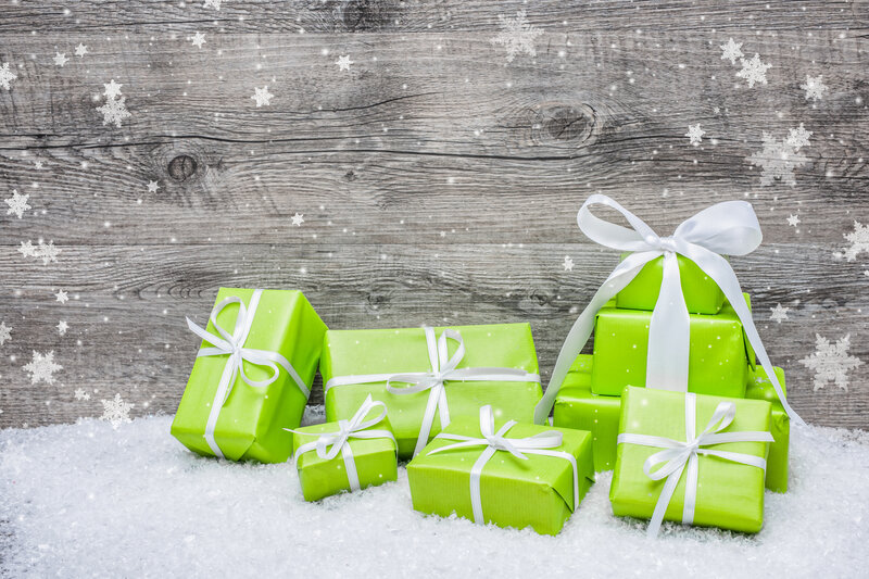 Green Gift Boxes in Snow