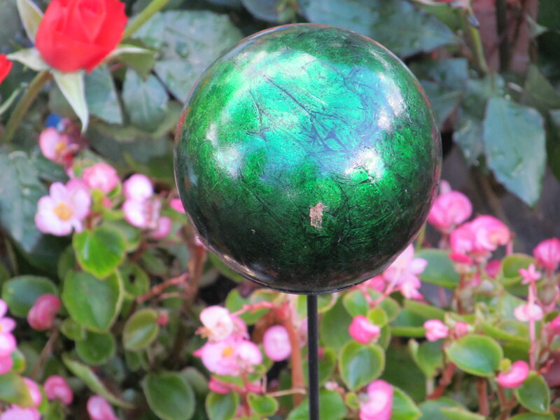 Green Glass Ball in Garden