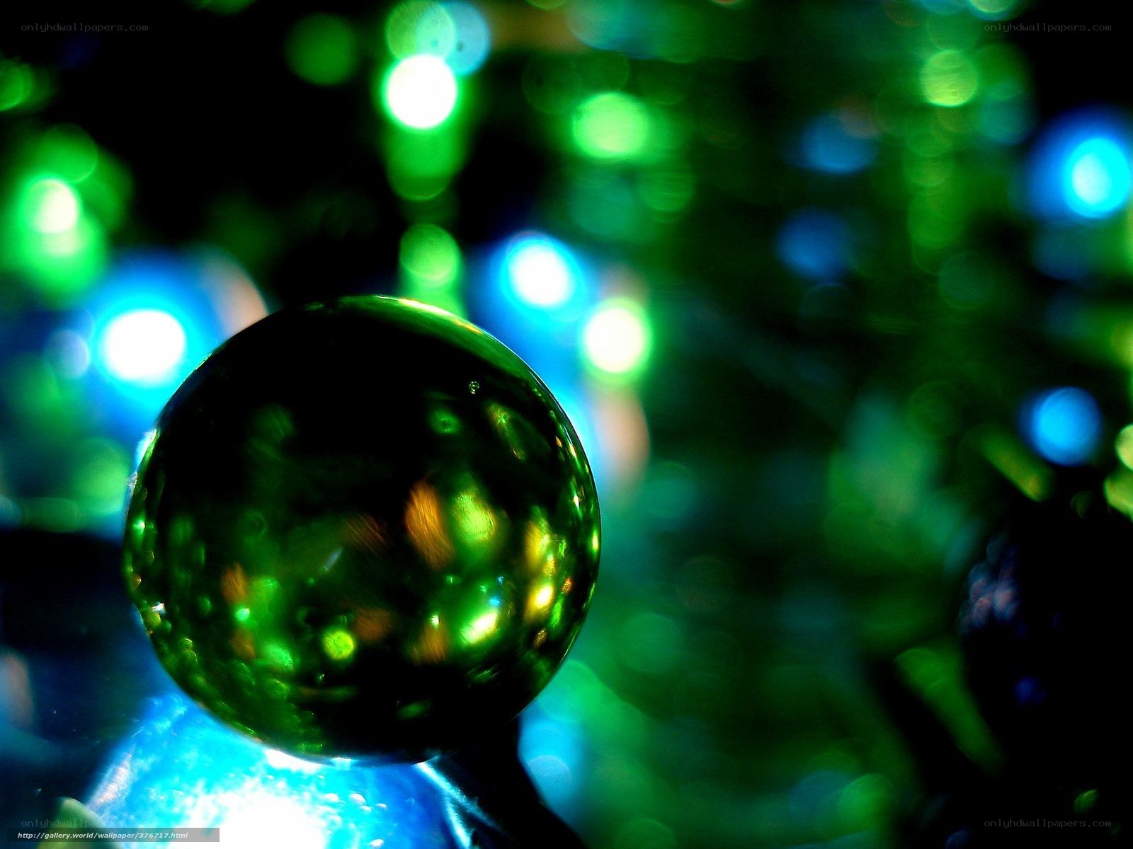green glass ball with lights