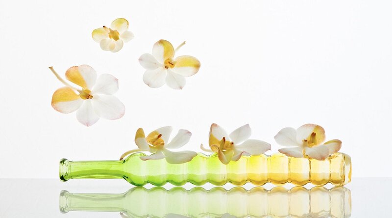 Green Glass Bottle with Flowers