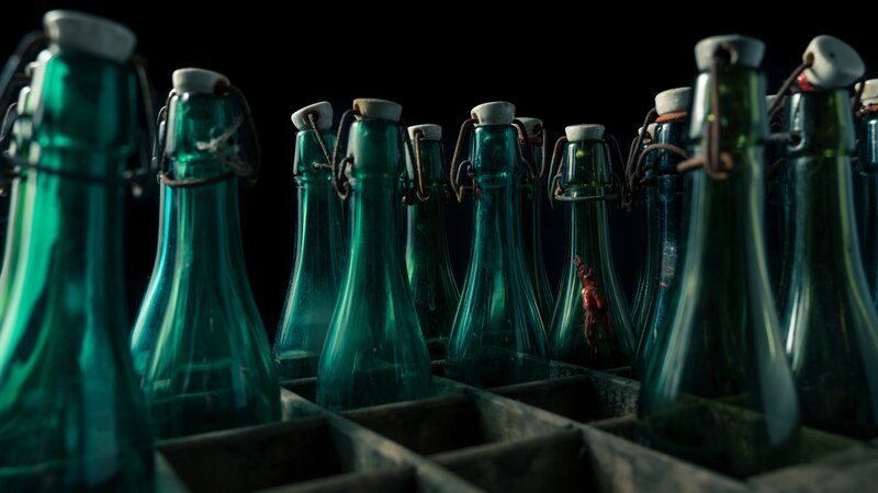 Green Glass Bottles — Dramatic