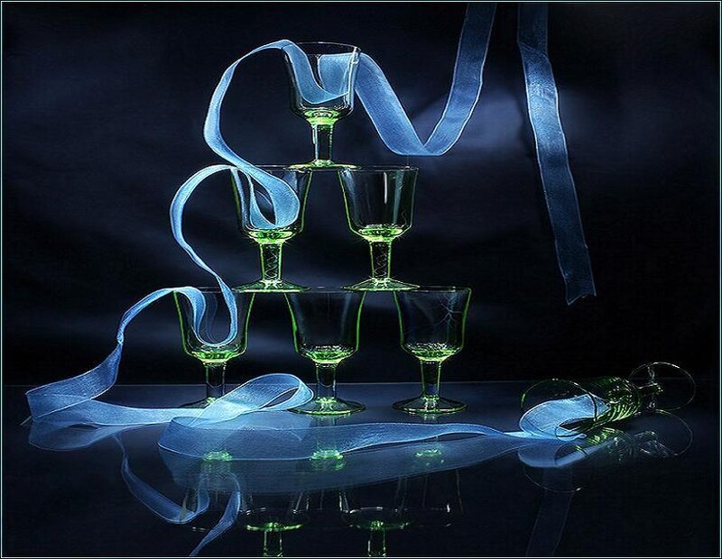 Green glasses pyramid with blue ribbon