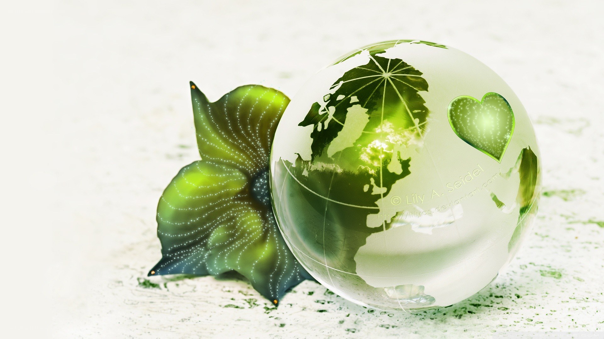 green globe with leaf and heart