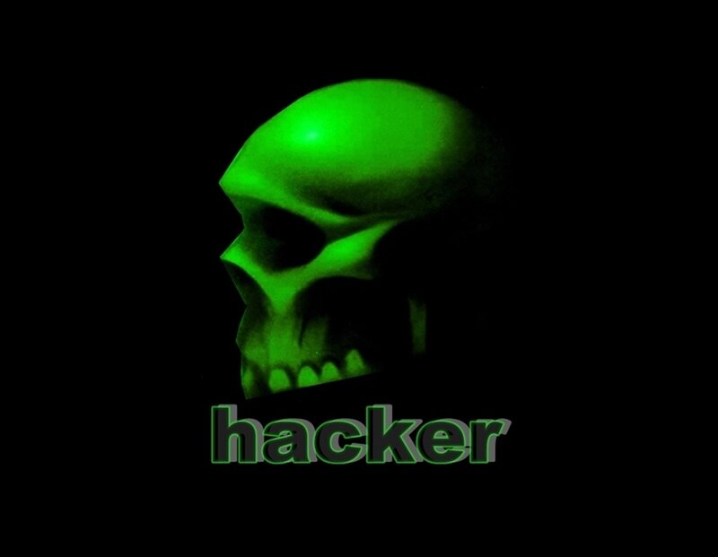 green glowing skull with hacker text
