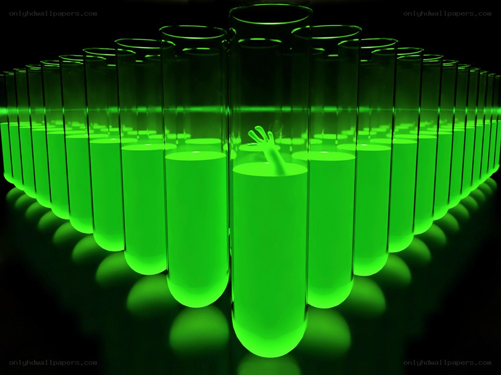 Green glowing test tubes with hand
