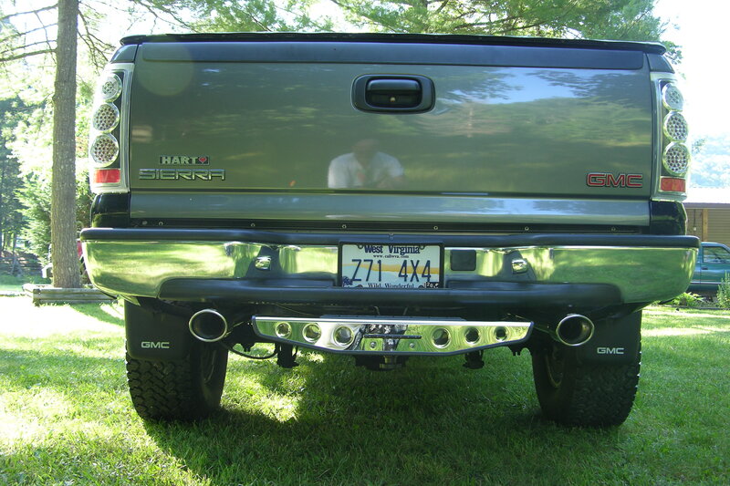green gmc sierra truck