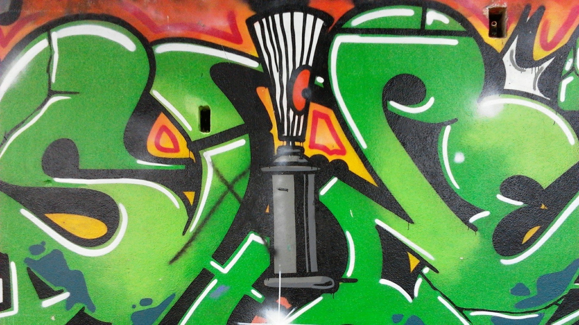 green graffiti with spray can