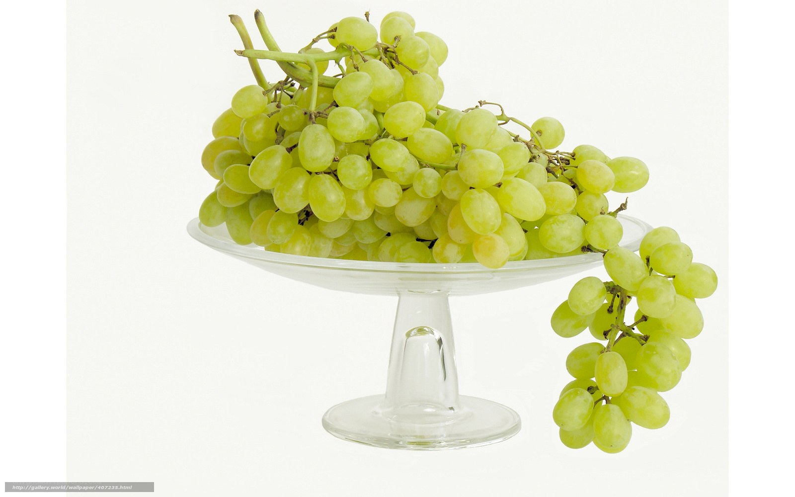 green grapes on a glass stand