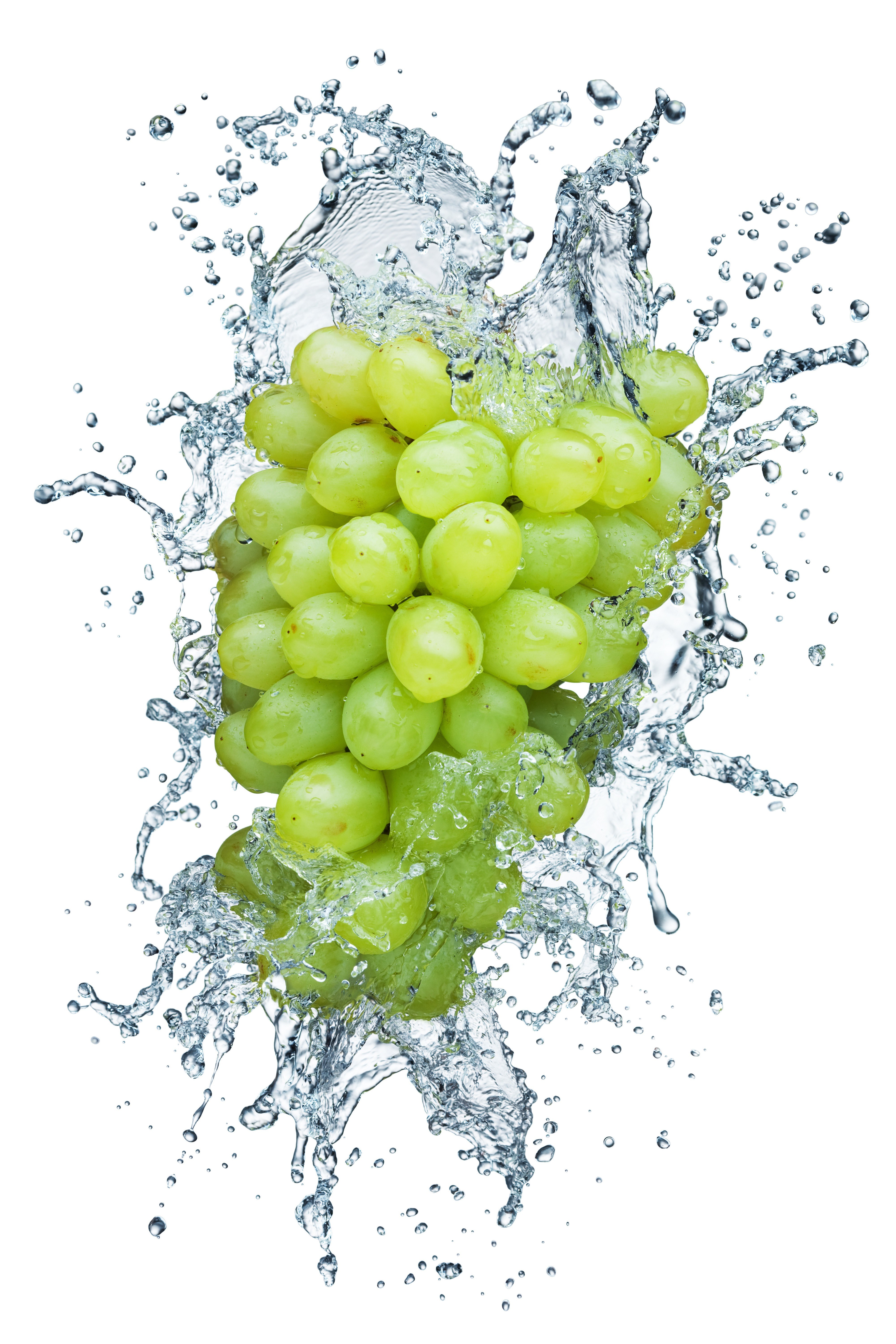 green grapes splashing in water