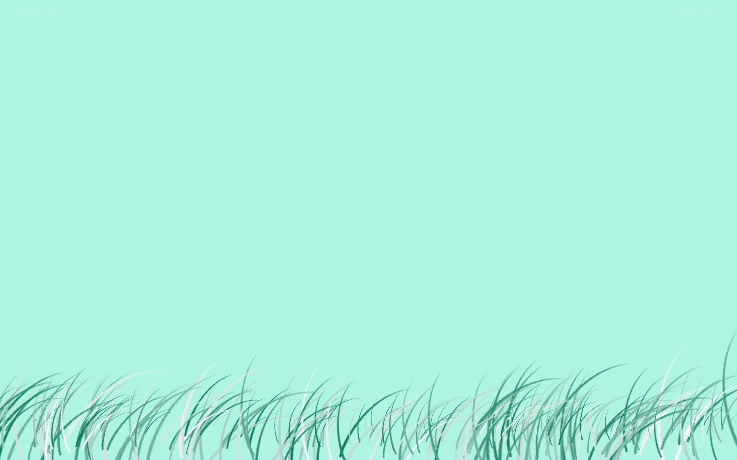 green grass against light blue