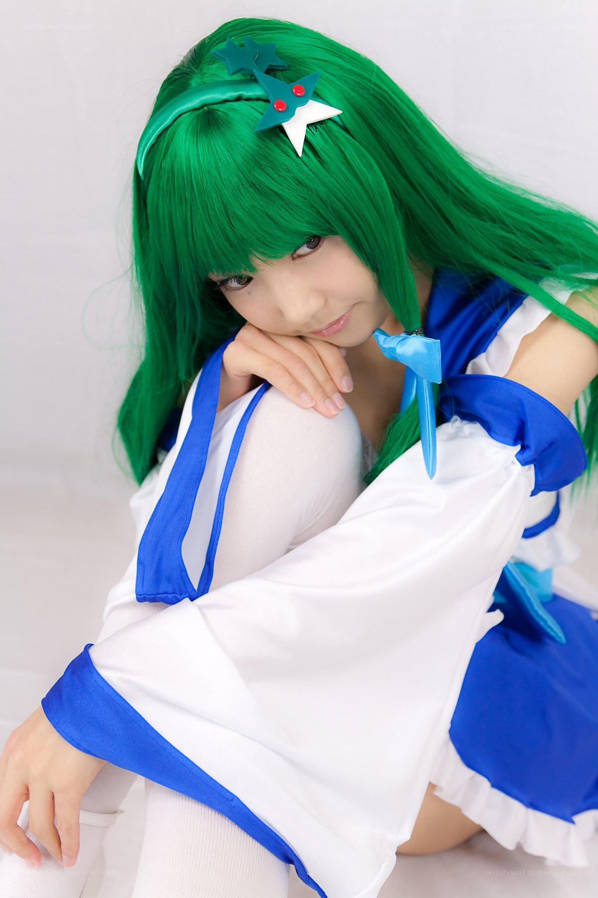 green-haired anime cosplayer