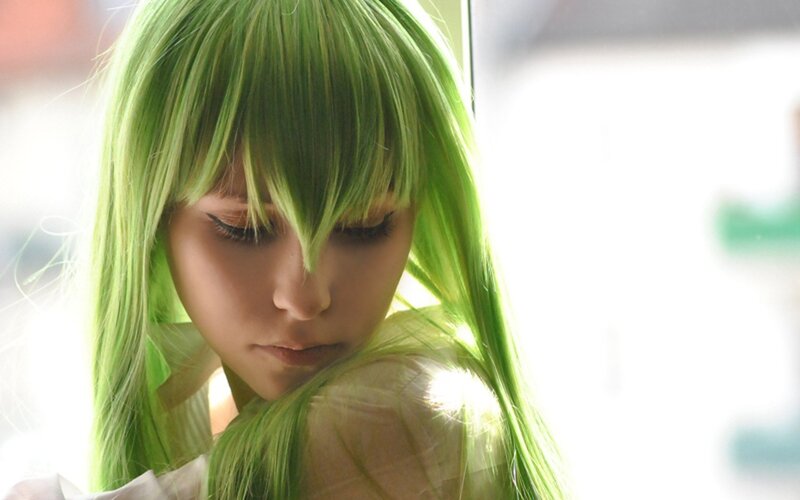 green-haired character in sunlight