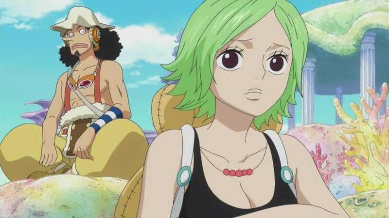 Green-haired girl and man on beach