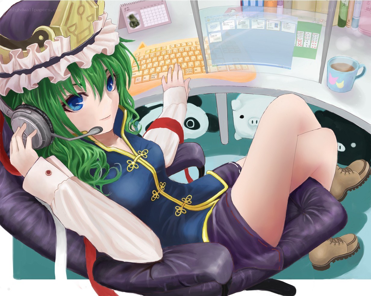 Green-haired girl at computer desk