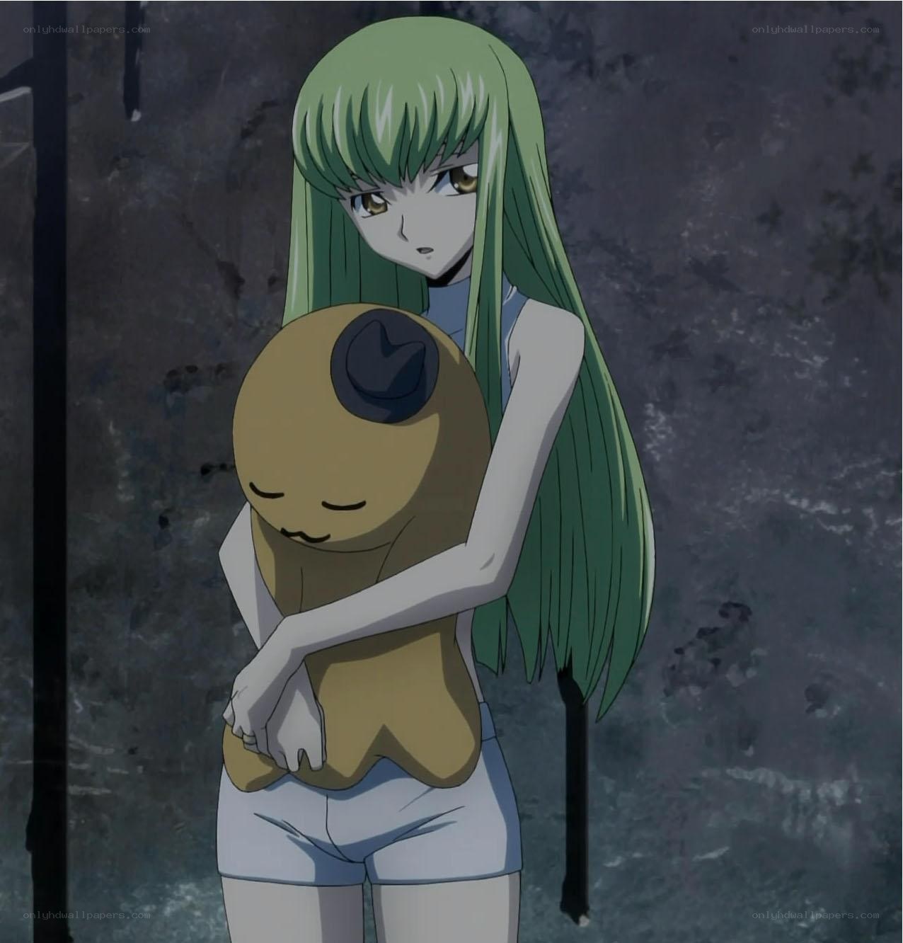 Green-haired girl holding a plush