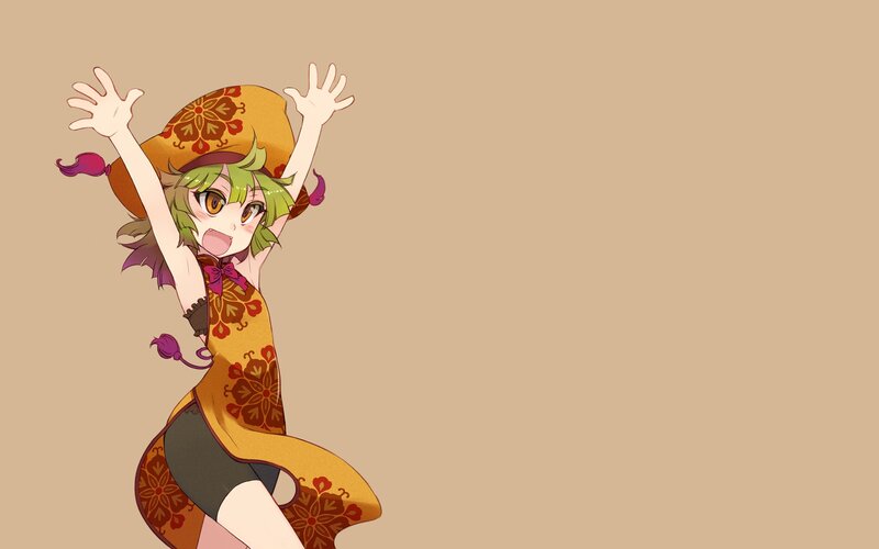 green-haired girl in patterned dress