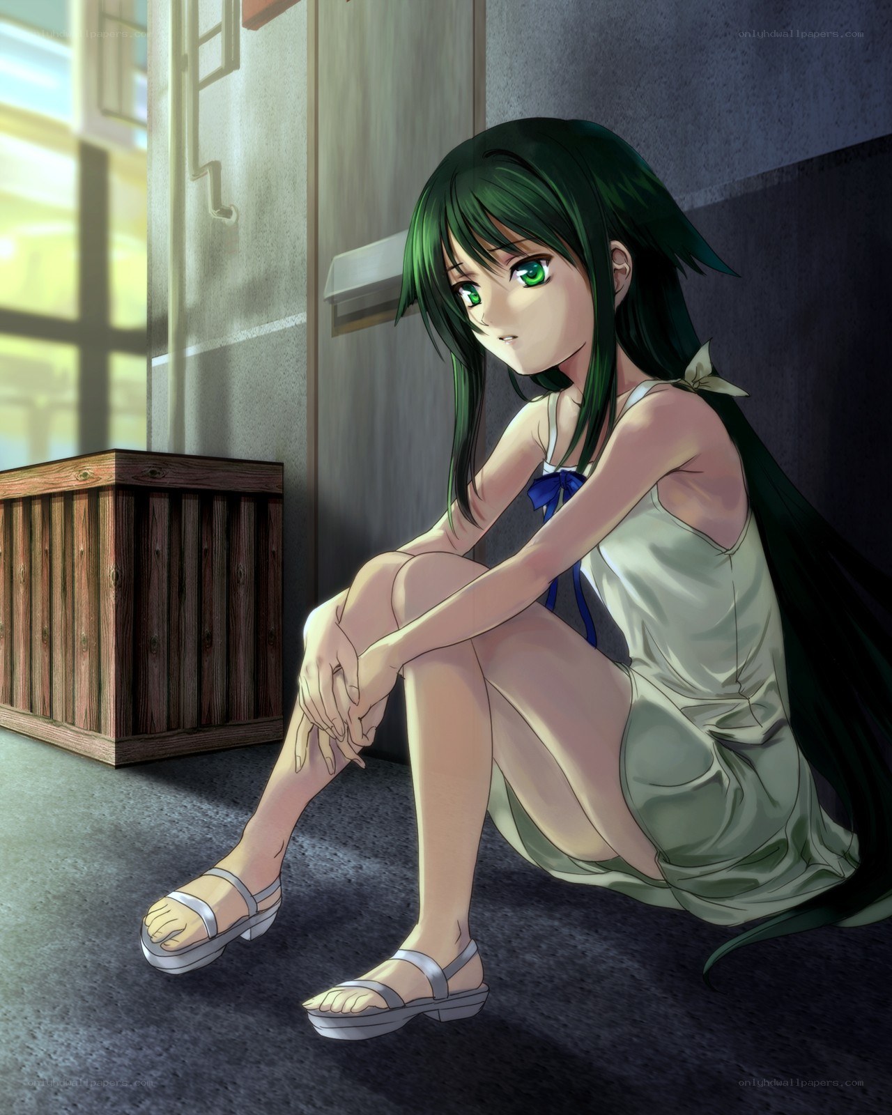 green-haired girl sitting on floor