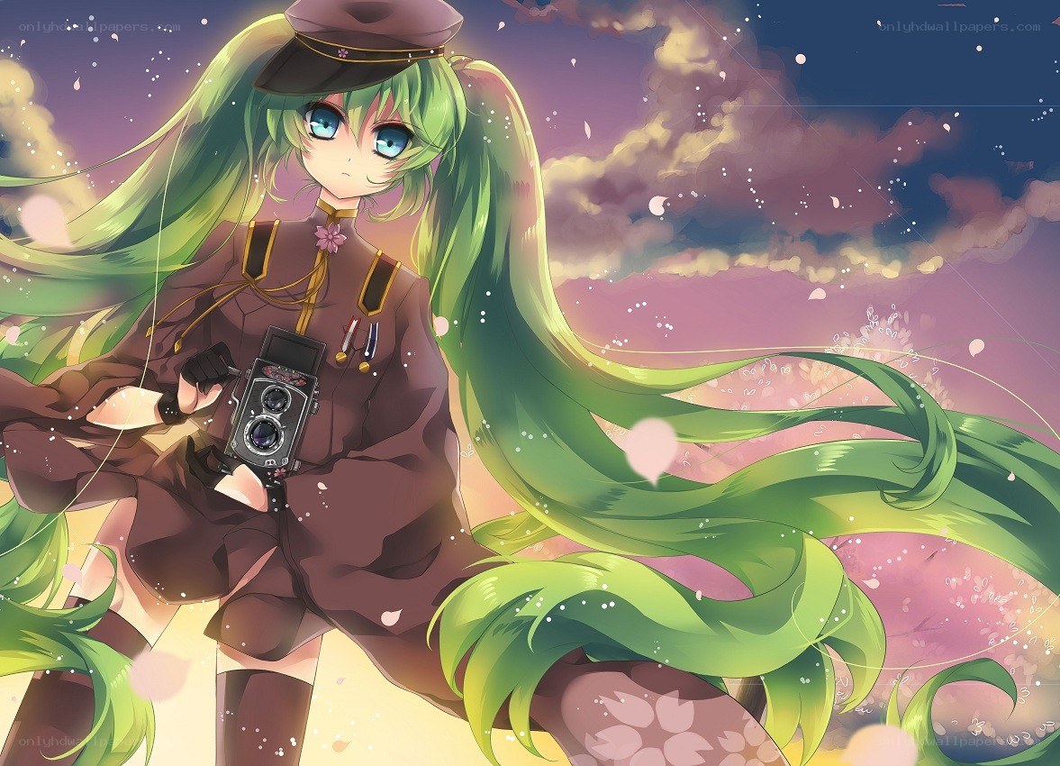 green-haired girl with camera