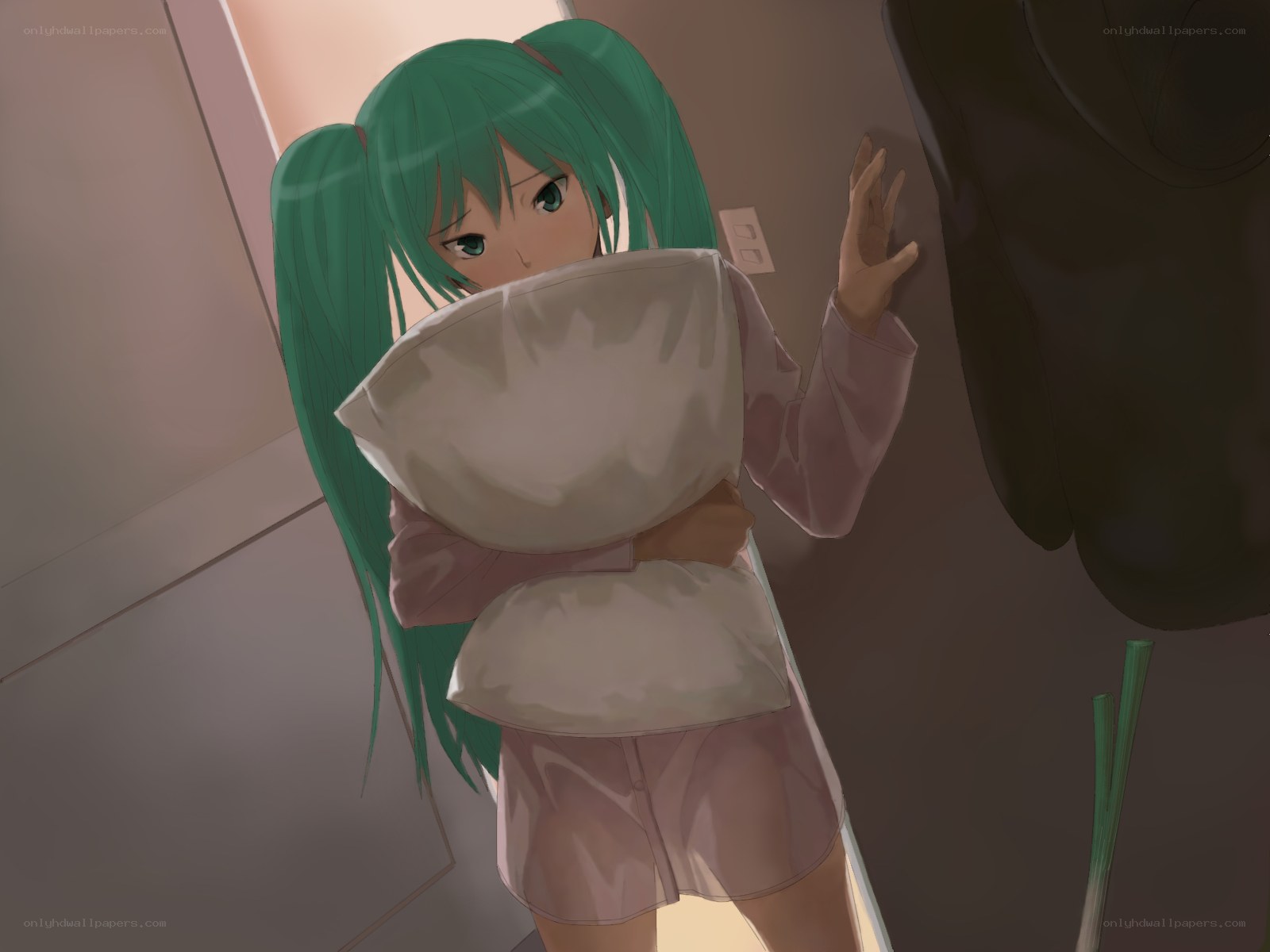 green-haired girl with pillows