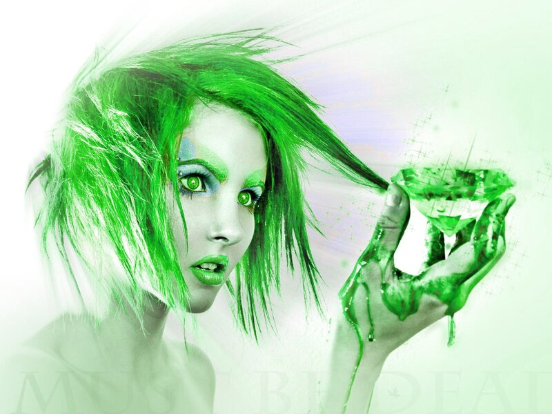 green-haired woman with glowing gem